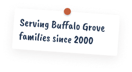A white note pinned with an orange push pin reads, Serving Buffalo Grove families since 2000 in blue, handwritten-style text.